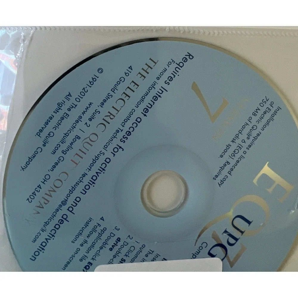 Electric Quilt 7 Upgrade Windows XP New In Opened Box. CD Never Removed. 2010‎